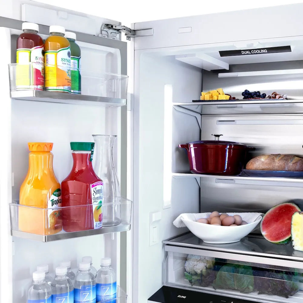 ZLINE Autograph Edition 36-inch refrigerator in satin stainless steel with bright white interior and champagne bronze accents RBIVZ-SN-36-CB, detail